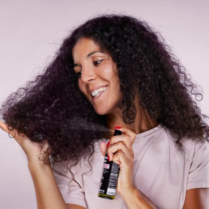 Spray ristrutturante e volumizzante